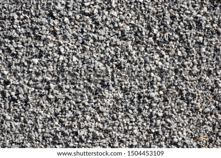     gray sand, smooth background wall                           