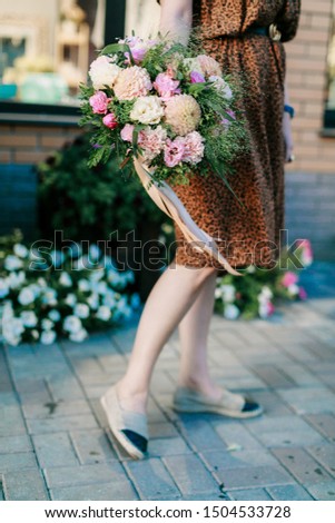 Florist collects a beautiful bouquet