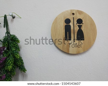 Wall signs for male and female toilets