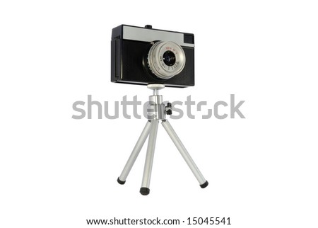Old camera on a tripod