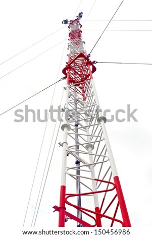 Telecommunication tower used to transmit television and 3g signals isolated on white 