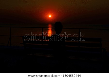 Black sea dawn sunset red background