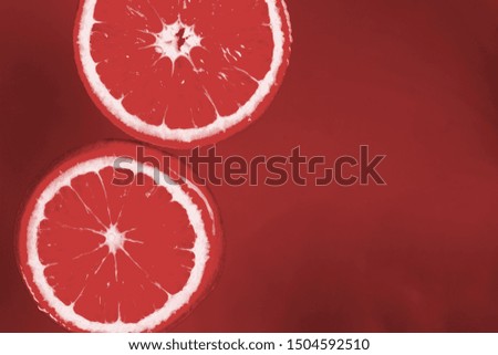 Grapefruits on red background with copy space
