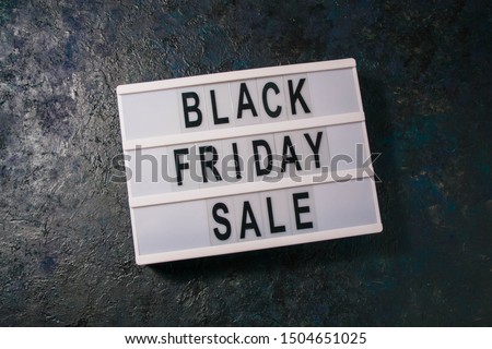 Black friday sale word on lightbox on dark background