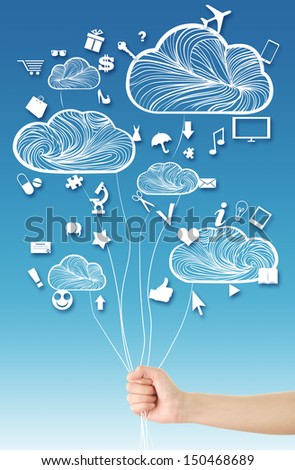 Hand holding abstract clouds(balloons)/Cloud computing concept, where hand holding clouds (balloons) and various web icons floating around them blue sky background