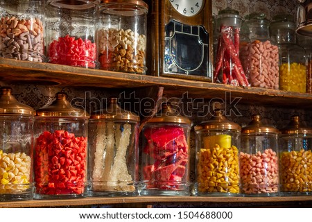Old candy store. Colorful candies in jars. Old fashioned retro style Royalty-Free Stock Photo #1504688000