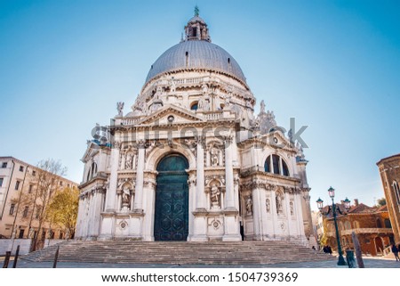 Facade of Santa Maria della Salute church in Venice. Sunny autumn day
