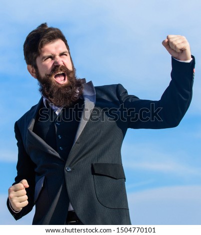 Success and luck. Being optimistic. Man bearded optimistic businessman wear formal suit sky background. Optimistic mood. Think like optimist. Celebrate success. Hopeful and confident about future.