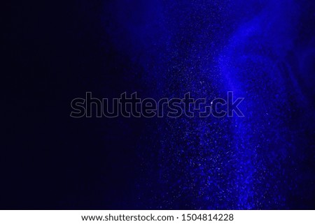 
powder of Galaxy and Nebula color spreading effect for makeup artist or graphic design in black background 