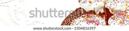 Happy Easter cake with sprinkles on white glaze. Easter cake on rustic wooden board. Horizontal banner for website design. Selective focus, free text space.  