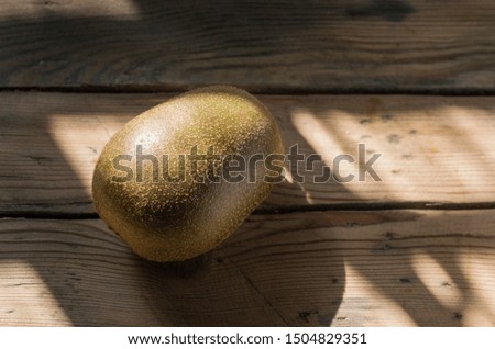 kiwi closeup on wooden background