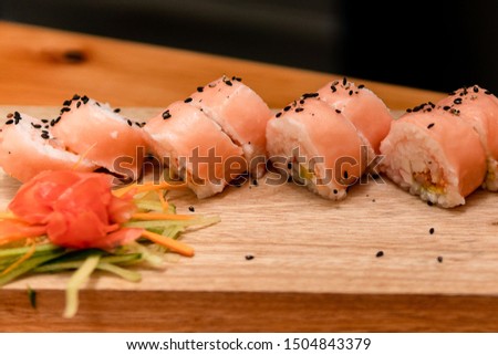 Surimi and shrimp sushi dish, served in wood with vegetables