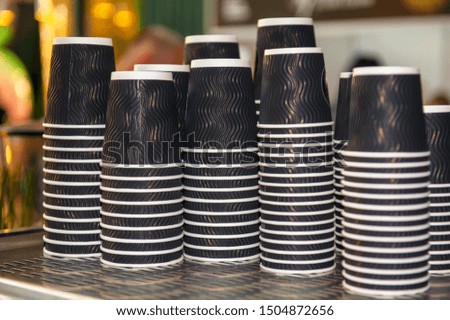 paper cups for coffee on restaurant table