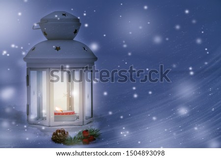 Christmas composition - a lantern with a burning candle under the Christmas tree, copy space, place for text