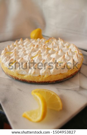 Lemon meringue pie on a marble slab 