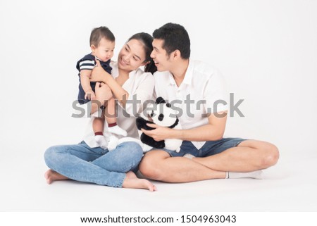 Happy Asian family are enjoy with son in studio 