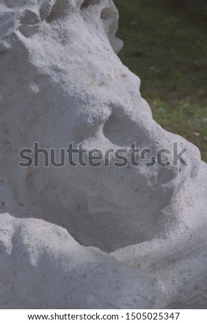 White statue of a lion background for quote
