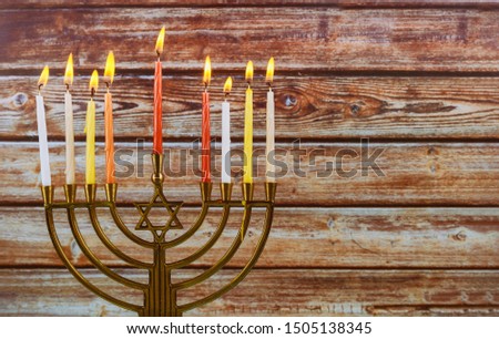 Chanukah candles all in a jewish symbol holiday