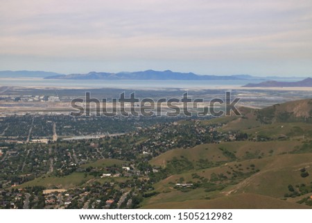 Antelope Island, downtown Salt Lake City and Great Salt Lake seen from Wasatch mountain foothills, Utah, USA