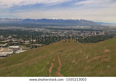 Downtown Salt Lake City and the snowcapped Oqquirh Mountain range, Utah, USA
