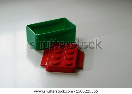 Selective focus on bricks shape plastic box storage isolated on white background