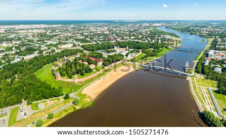 Veliky Novgorod, Russia. Novgorod Kremlin (Detinets), Volkhov River. Flight over the city Royalty-Free Stock Photo #1505271476