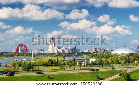 Panorama of Moscow in summer, Russia. Landscape of Krylatskoye district in Moscow north-west (northwest) on sunny day. Skyline of Moscow city with modern buildings on blue sky background.