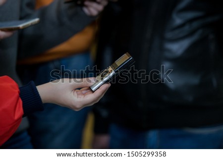 voice recorder phone microphone in hand, press conference