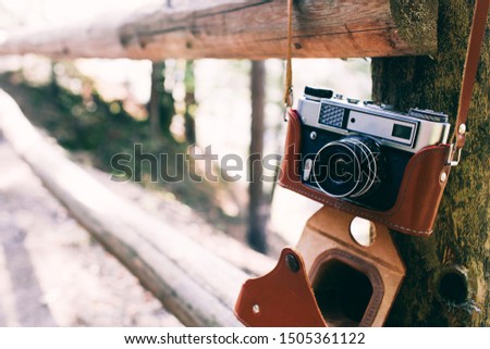 vintage camera in autumn park