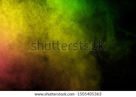 Multicolored particles explosion on white background. Colorful dust splatter on white background.
