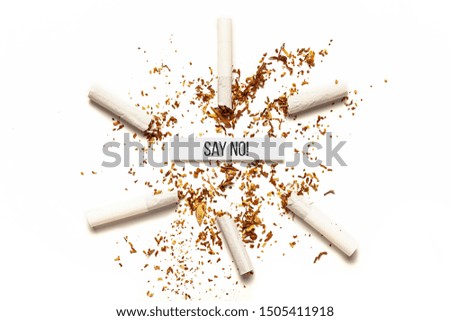 Cigarettes on white background. Addiction to smoking, harm of tobacco smoke. Bad habit, smoking kills.