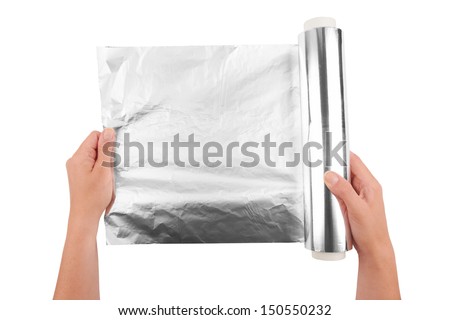 woman holding a roll of aluminum foil  Royalty-Free Stock Photo #150550232