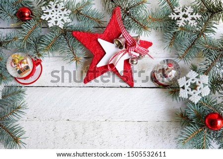 Christmas background with decorative star, fir branches and new year decor, copy space
