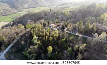 Nature view by drone, wood, hill and grass. Aerial view