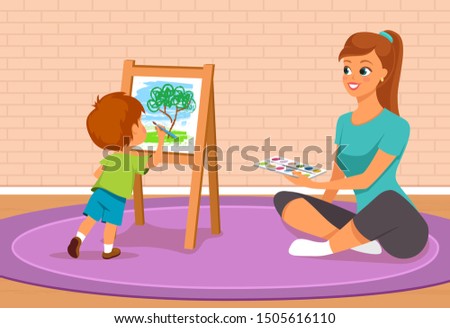 Mother and her kid painting together. Family leisure 