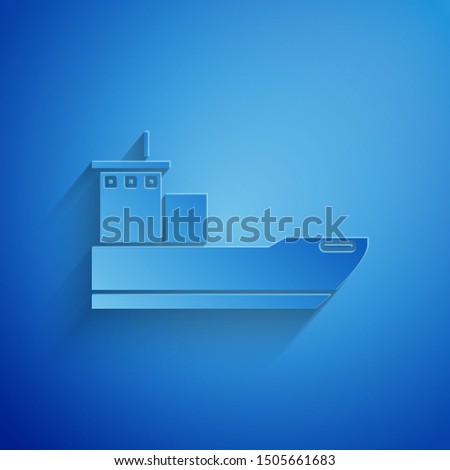 Paper cut Cargo ship icon isolated on blue background. Paper art style. Vector Illustration
