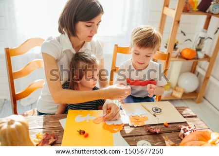 happy family mother father and children in costumes and makeup on a celebration of Halloween Happy Halloween concept