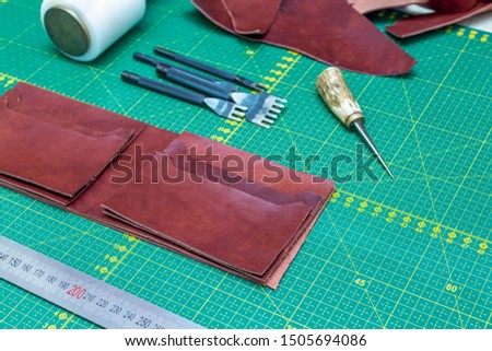 Creating sewing leather handmade wallet leathercraft. Pattern, tools, leather