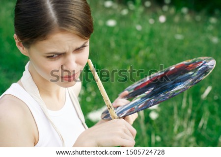 woman idea creativity palette artist paints summer brush young model