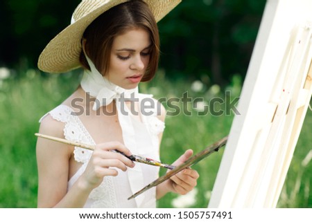 woman palette and paints canvas brush artist young painting