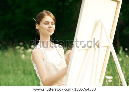 woman young beautiful creative drawing paint brush artist canvas