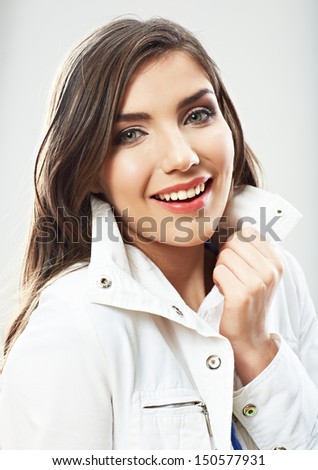 Woman face close up white background isolated. Smiling girl portrait. Female model studio poses.