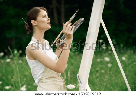 woman artist painting brush oil canvas idea young summer