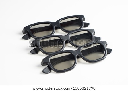 3D glasses.View 3D movie theater.Concept - Sale of 3D films.Glasses white background.Three-dimensional films.Modern home theater.Three-dimensional spectacles.Glasses for watching stereoscopic films