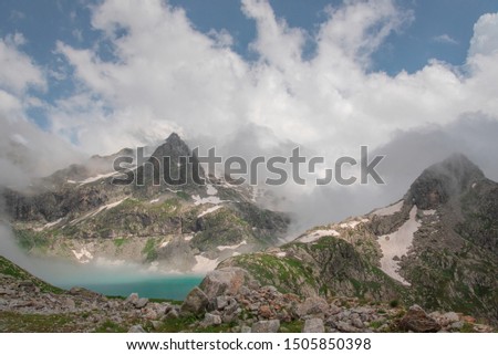 Alpine Lake Kluhor in the Teberda Reserve Karachay-Cherkess Republic Caucasus Russia