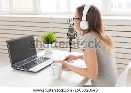 Podcasting, dj and broadcast concept - Presenter or host in radio station hosting show for radio