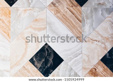 Real photo of marble floor tile pattern for background. Gray and beige colors 