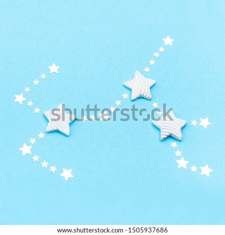 Zodiac constellation Sagittarius, Archer on blue background