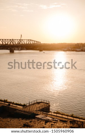 view of the city and river from a house under construction.Cityscape. Dawn in the morning.