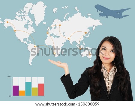 Asian lady shows the development of the world, isolated on a blue background
